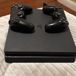 PS4 with 2 playstation remotes