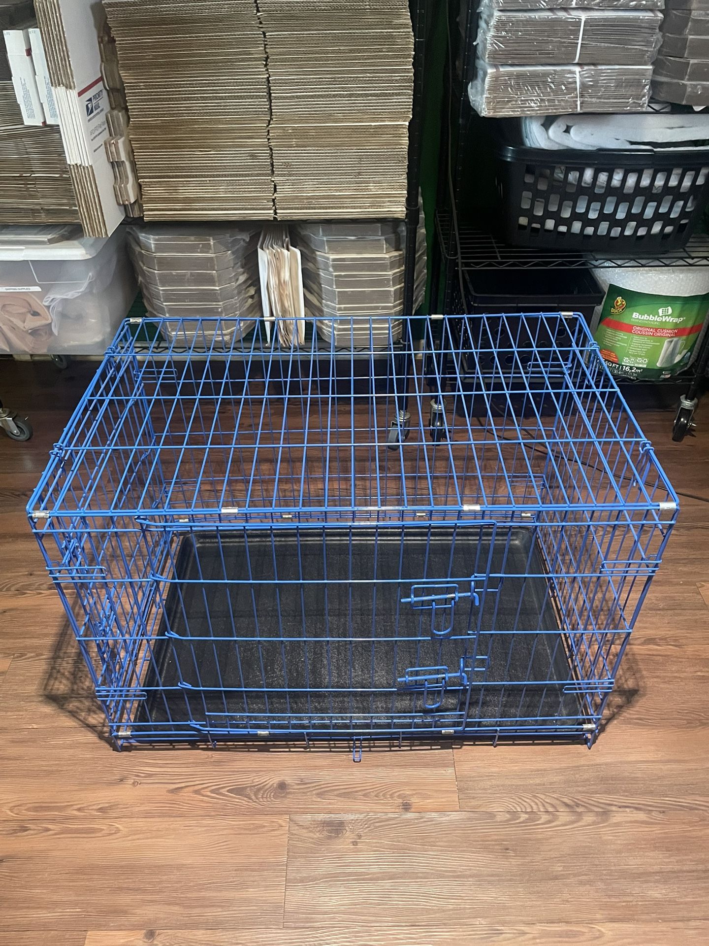 Blue Midsize Folding Dog Crate.