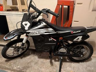 Razor MX650 electric dirt bike with new batteries