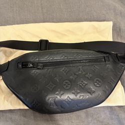 LV monogram shadow discovery bumbag