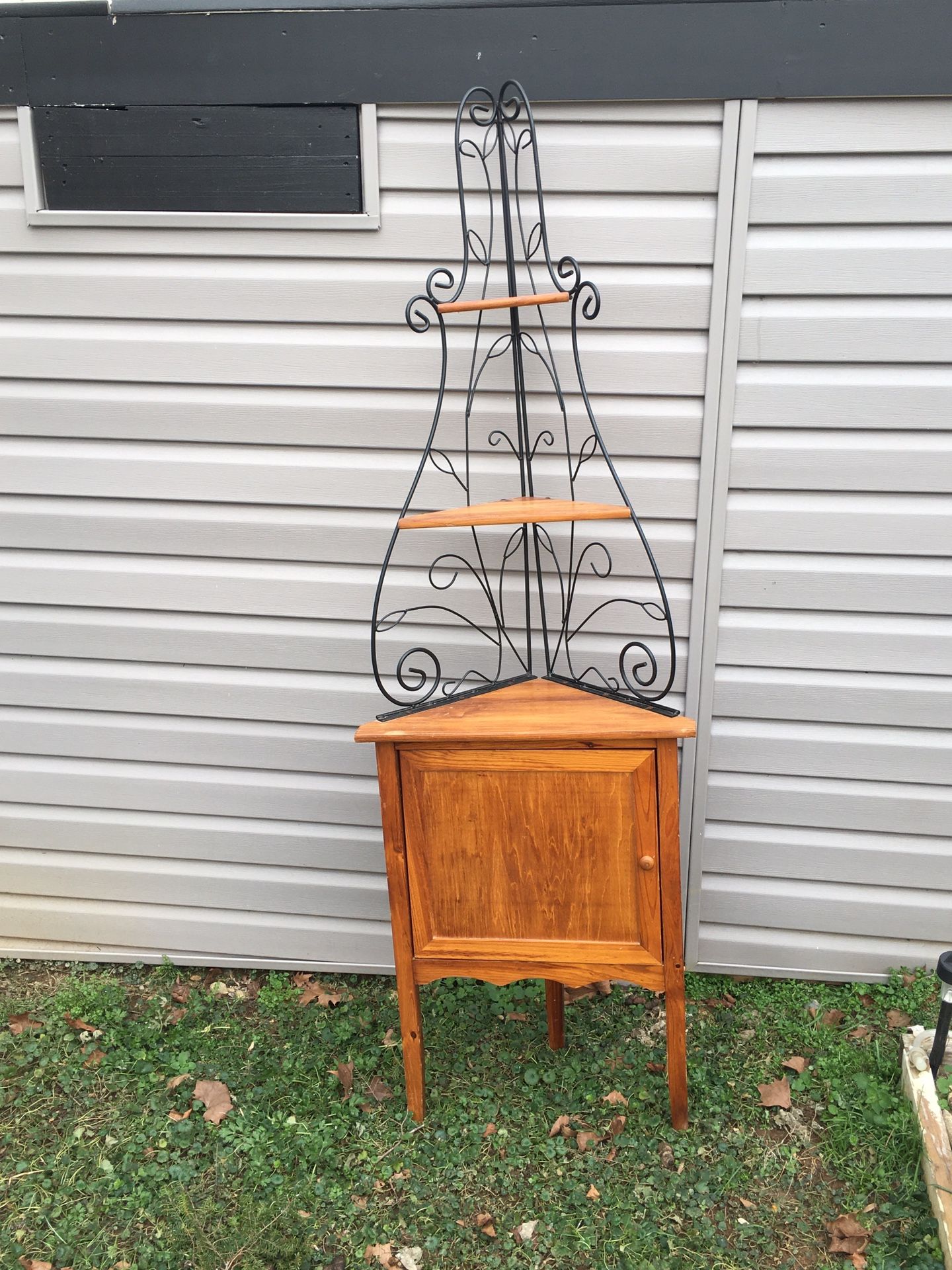 Corner shelving unit with storage.