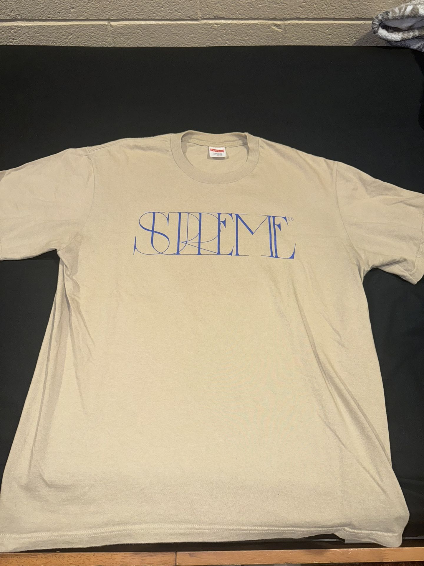 supreme tee