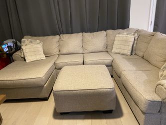 Large Rooms To Go Sectional with Matching Ottoman – $650