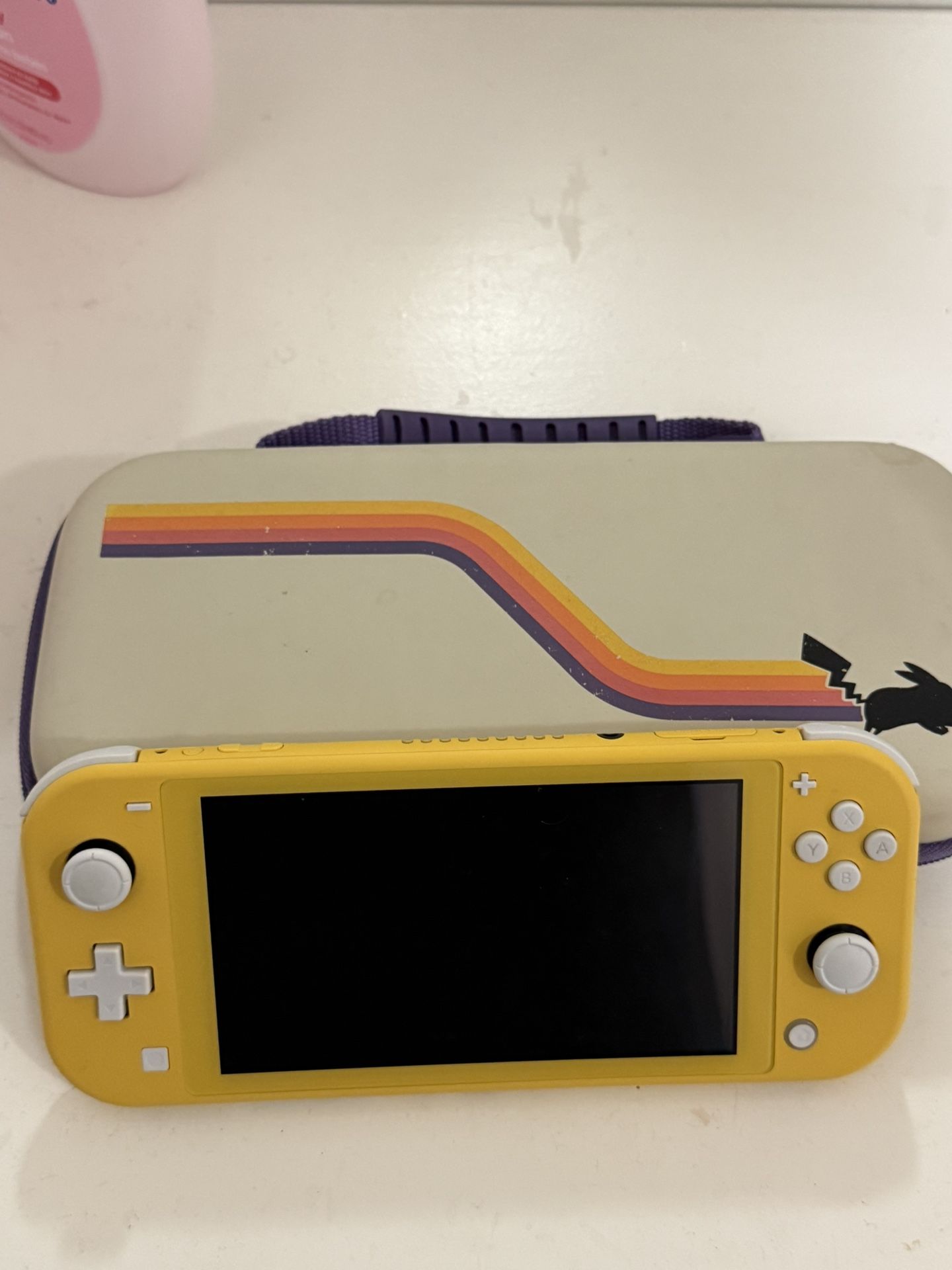Nintendo Lite + Pokémon Violet + Pikachu Case