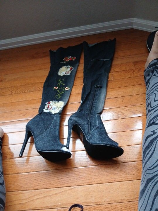 Black. Thigh high jean hills