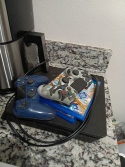 PS4 Slim with Two Controllers and Game