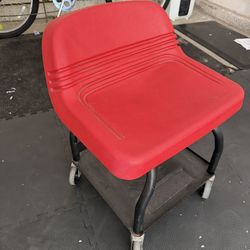 Red movable wheelie chair