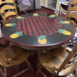 Pedestal Round Table 48” Wide And 4 Chairs