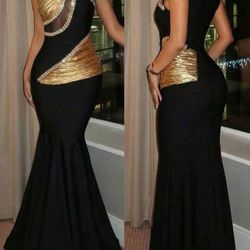 Black and gold sleeveless women grown elegant evening celebrates events. Mermaid style