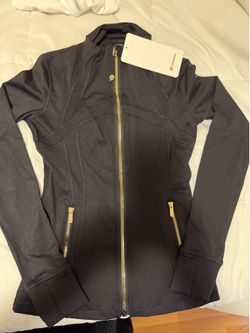 lululemon Black with gold zipper size 2