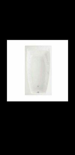 New American Standard Colony 5 ft. x 32.75 in. Reversible Drain Soaking Bathtub in White