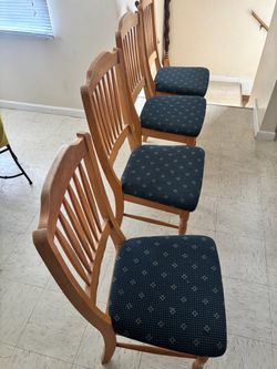Four wooden chairs