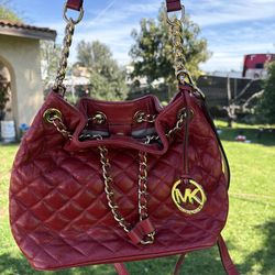 Red leather Micheal kors bag with original bag