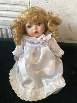 Beautiful little angel musical doll, gorgeous goldy locks hair, head rotates