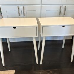 Two white bedside tables - single drawer