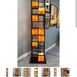 George Kovacs Dorian Bronze and Amber Art Glass 8-Light Floor Lamp from the Tower Collection. 