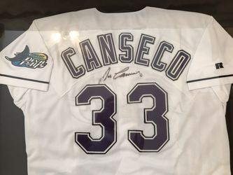 Framed Autographed Jose Canseco Tampa Bay Devil Rays Jersey
