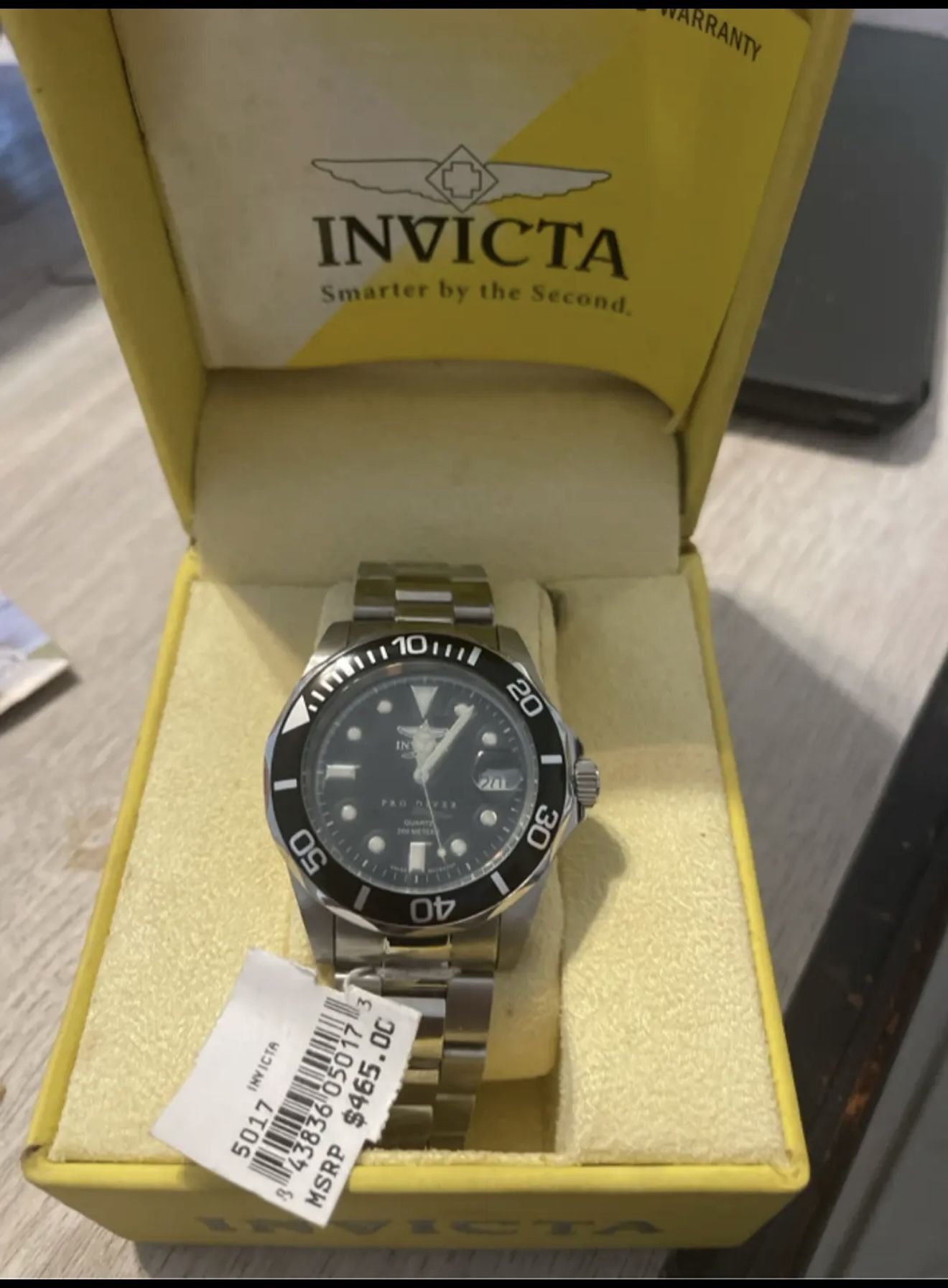 Men's Invicta Watch. Black Face, Water Resistant 200m. Model 5017