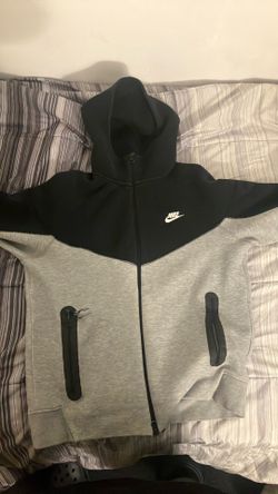 Gray and black large Nike tech