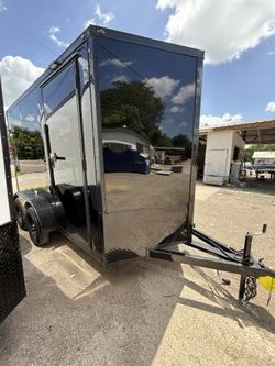 2026 6’x12’x7 TANDEM AXLE MIDNIGHT ENCLOSED CARGO TRAILER