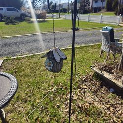Praise is firm very cute birdhouse with shepherd's hook