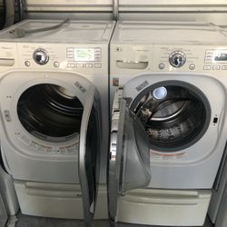 Lg Washer And Dryer Set On Pedestal 