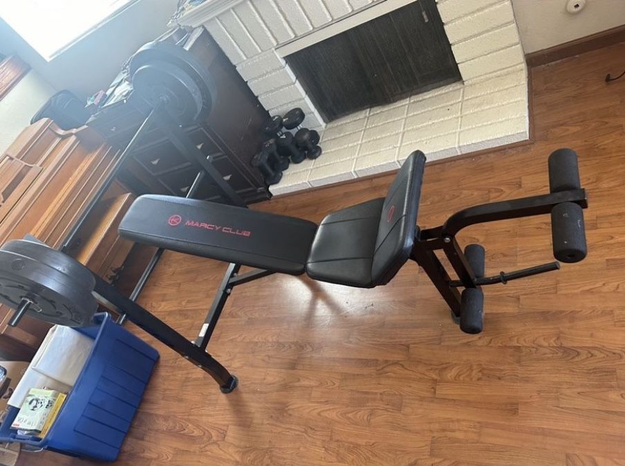 Adjustable bench with barbells and weights for sale