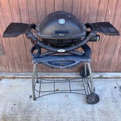 Weber Q1200 BBQ with stand and cover, new over $450