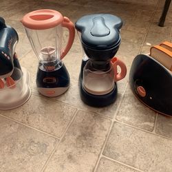 Kids play blender, coffee machine, toaster, blender