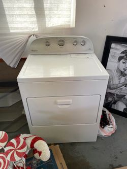 White Whirlpool Electric Dryer With AccuDry Sensor drying system