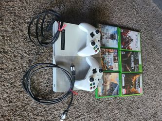 Xbox 1 S, 2 controllers, 3 Xbox 360 games,3 Xbox 1 games, power cord, and HDMI cable.