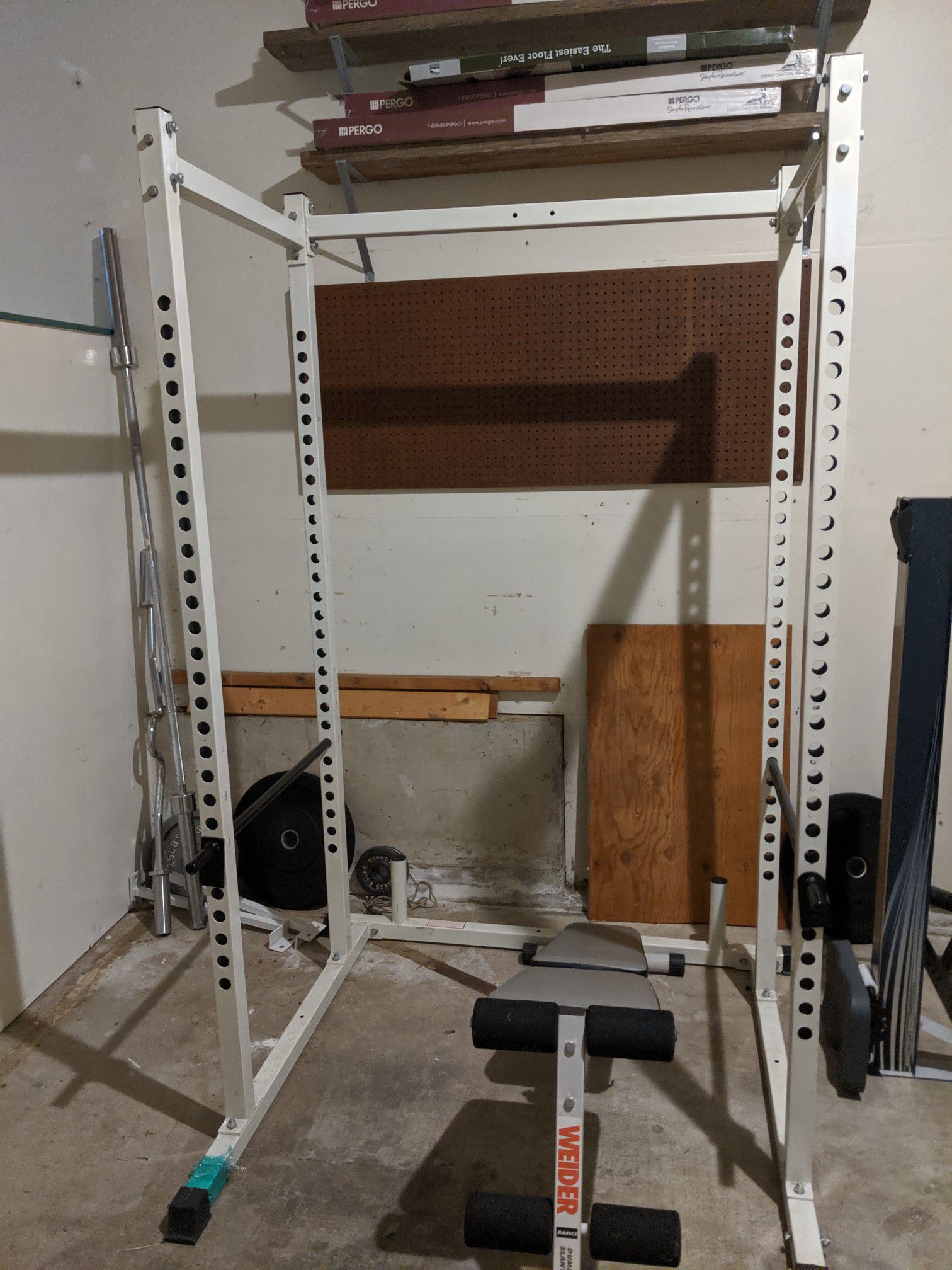 Squat Rack, barbells, weights, benches