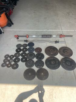 200 lbs Weight Plates and 5 ft stretch bar and 4 ft curb bars