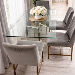 Glass table and grey chairs
