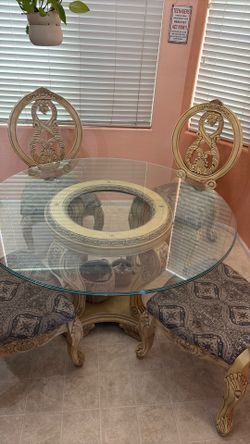 Glass Dinning table and 4 chairs