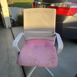 pink and white rolling chair