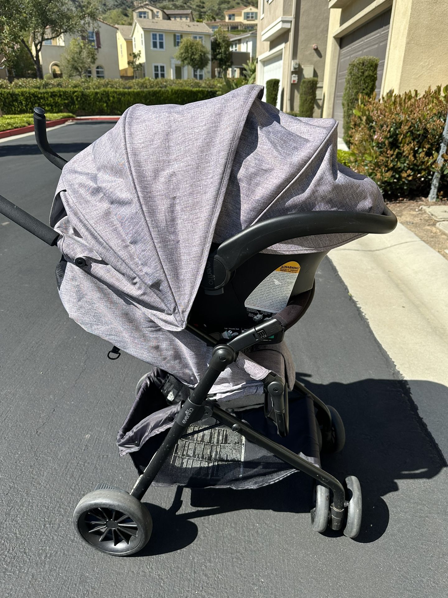 Evenflo Sibby Travel System Car Seat With Stroller And Base In good used condition. Please zoom pictures for more details. Newly washed. Pick up