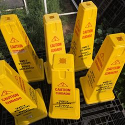 CAUTION WET FLOOR SIGNS. 