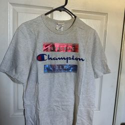 Champion Tee