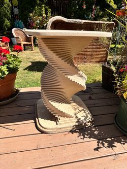 Vintage braided rattan & wicket chairs with table base.