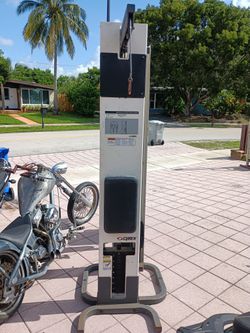 Exercise Equipment Pull Down Machine/Ab Machine And A Seated Row Machine 