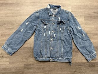 Woman’s light blue denim jacket