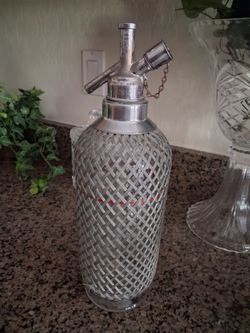 Antique silver dispenser.\nWorks great