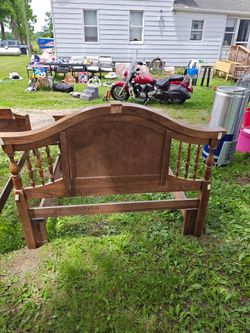 Old real wood. Queen or king bed.