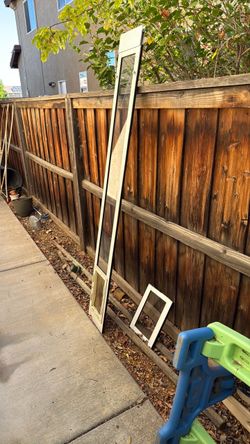 Pet door insert for sliding glass door