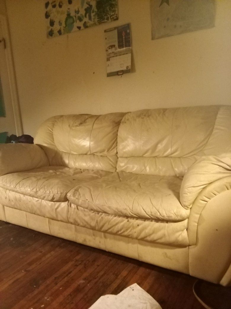 Leather Tan Love seat 