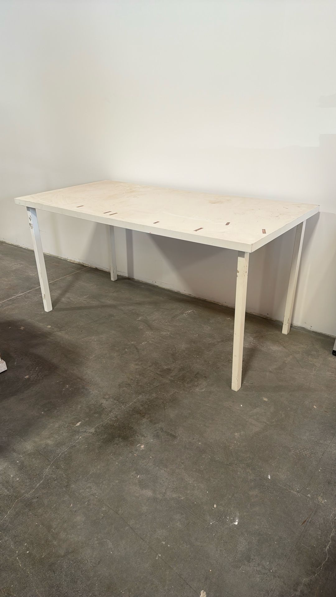 5’ L x 2.5’ W x 29” H White Table