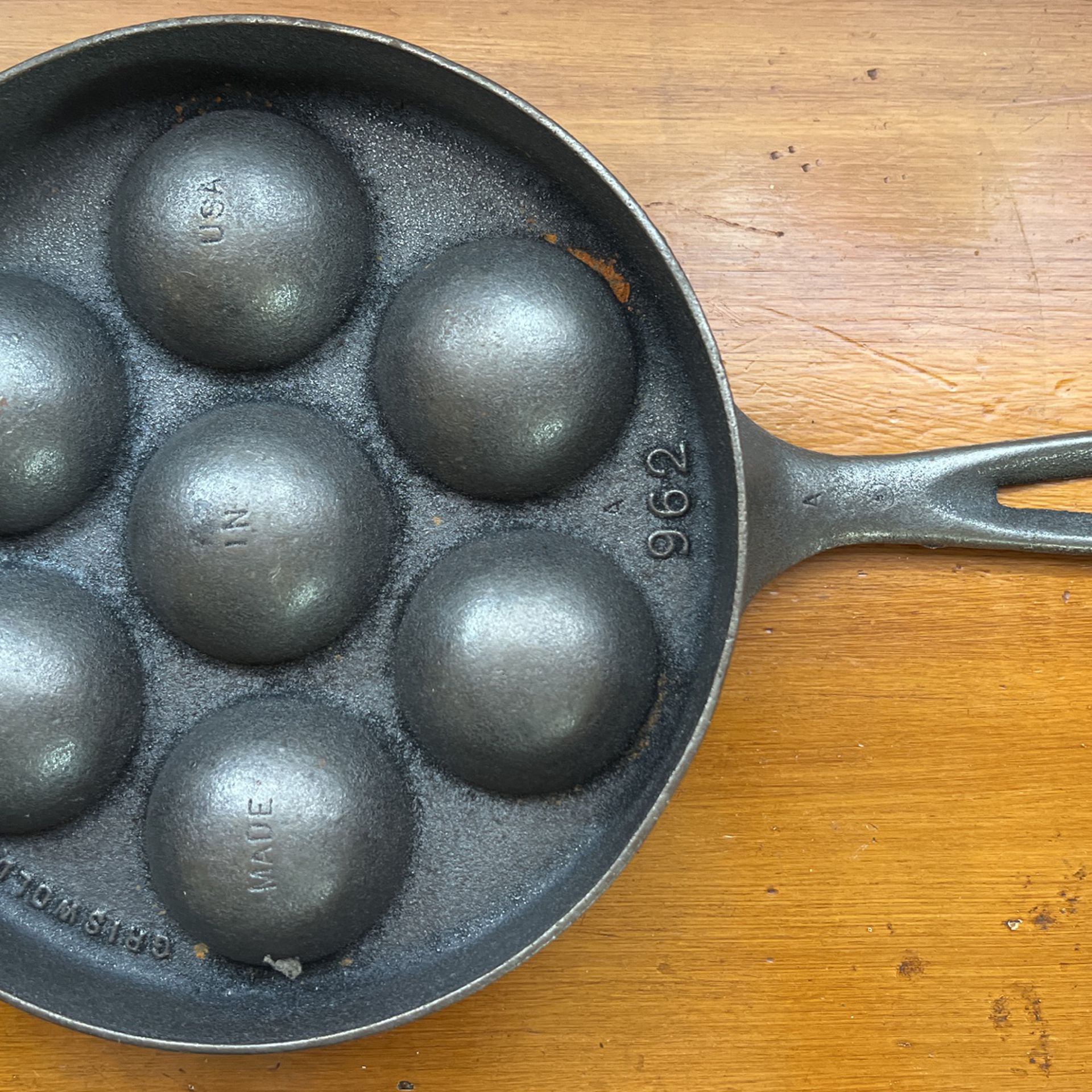 Aebleskiver pan being used. Griswold cast iron. Induction stovetop. : r/ castiron