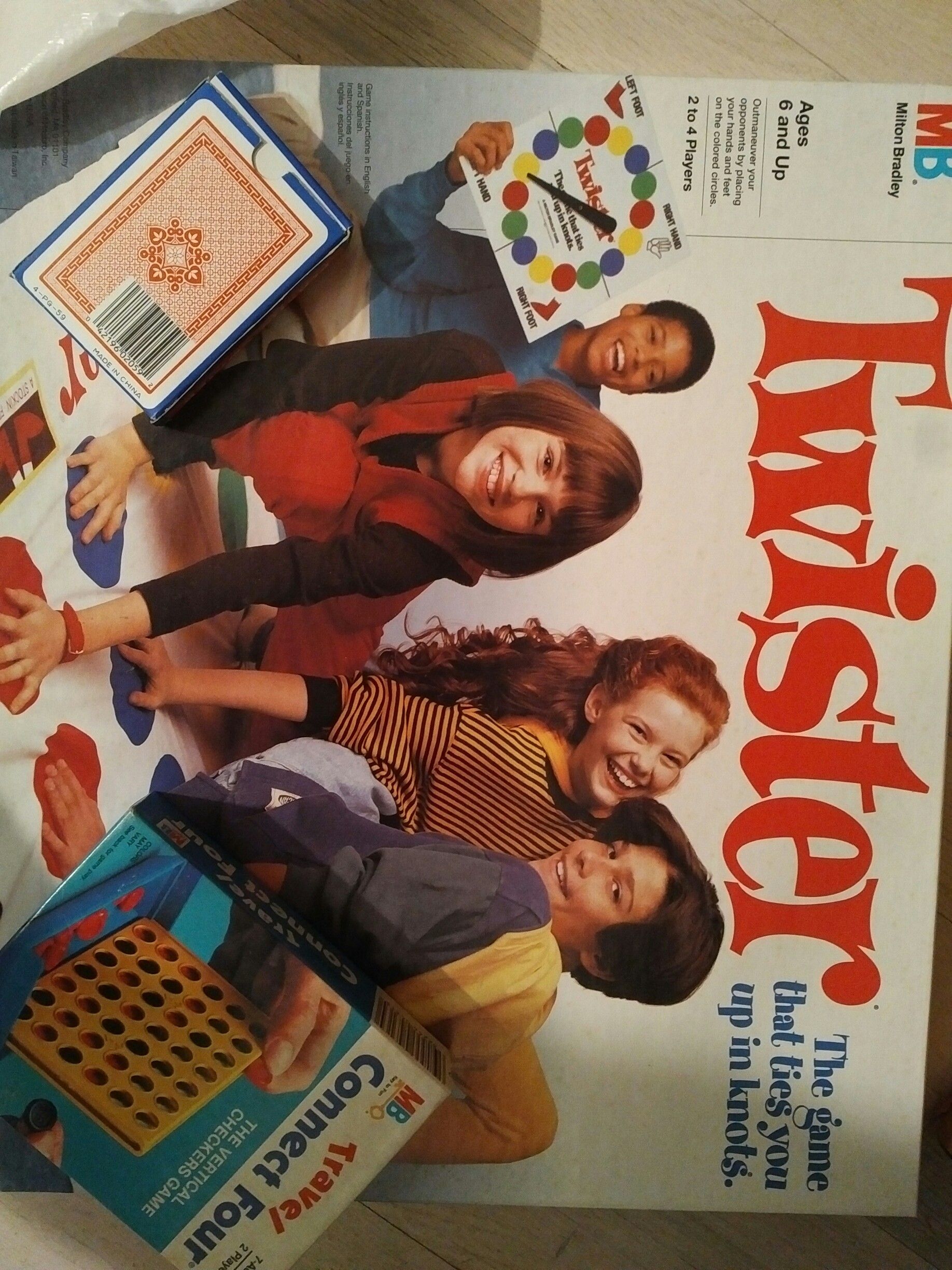 Twister game, travel size Connect Four, a deck of playing cards.