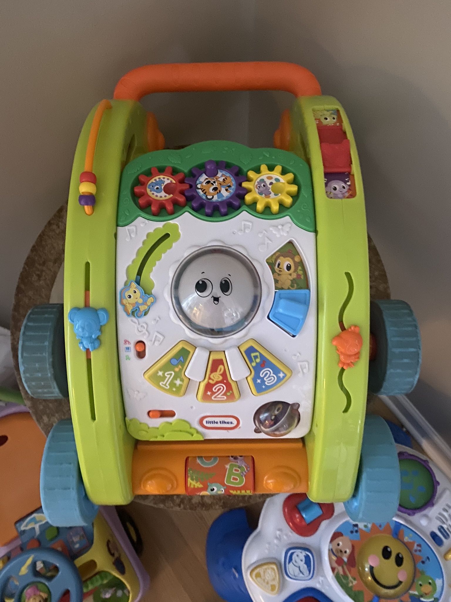 3 Different Walkers And Kids Ride On Toys